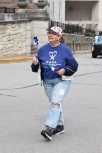 Woman with CASA shirt on