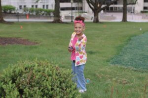 Little girl smiling at camera