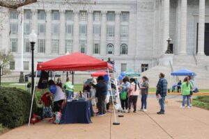 People visiting tents