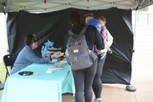 KVC handing out items
